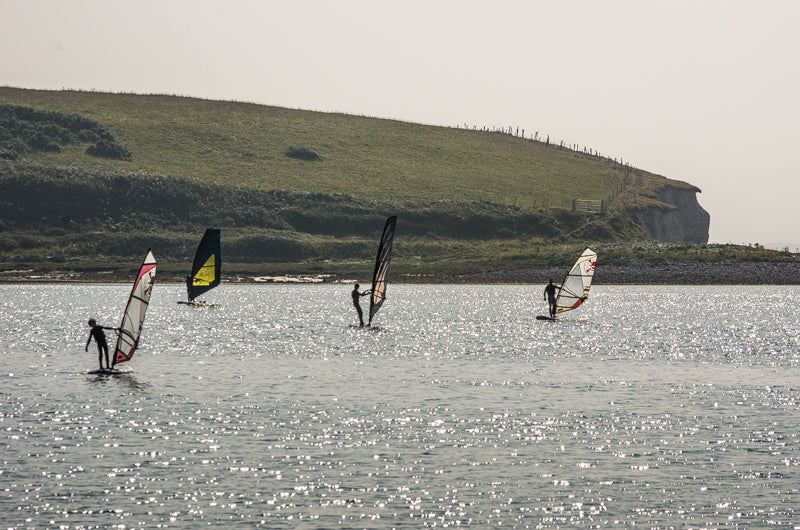 Windsurfers on flat water at Rusheen Bay, Galway