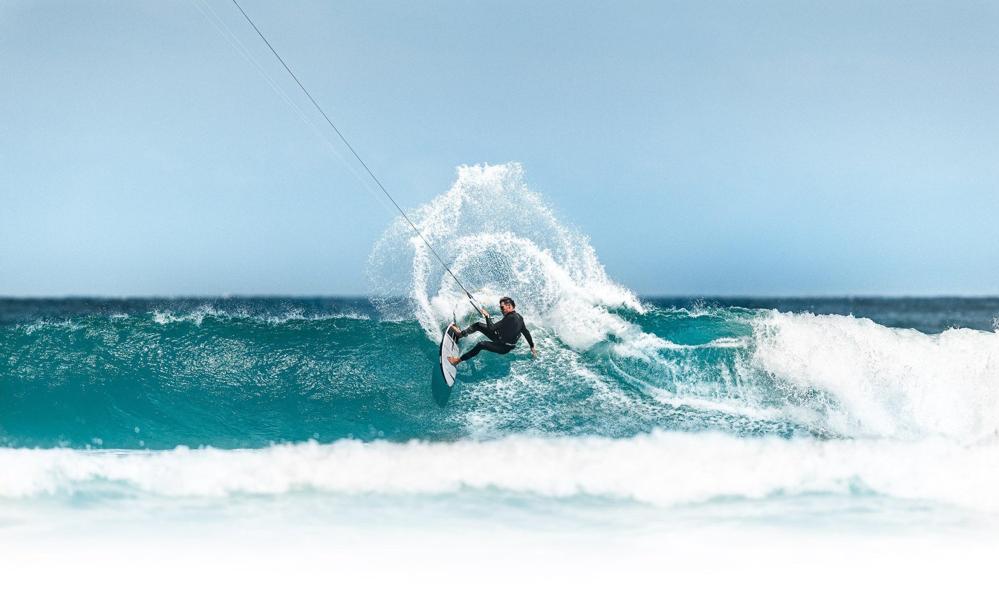 Core Ripper 6 surfboard wave riding action — launch campaign image, available in Ireland from Paddy in the Elements