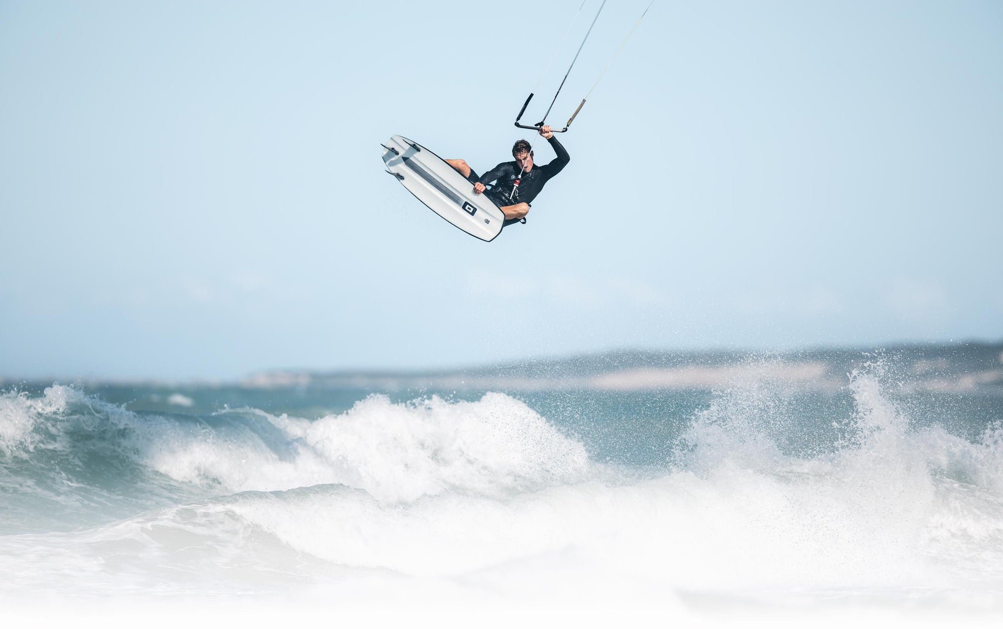 Core 720 IV strapless freestyle surfboard in action — launch campaign image, available in Ireland from Paddy in the Elements