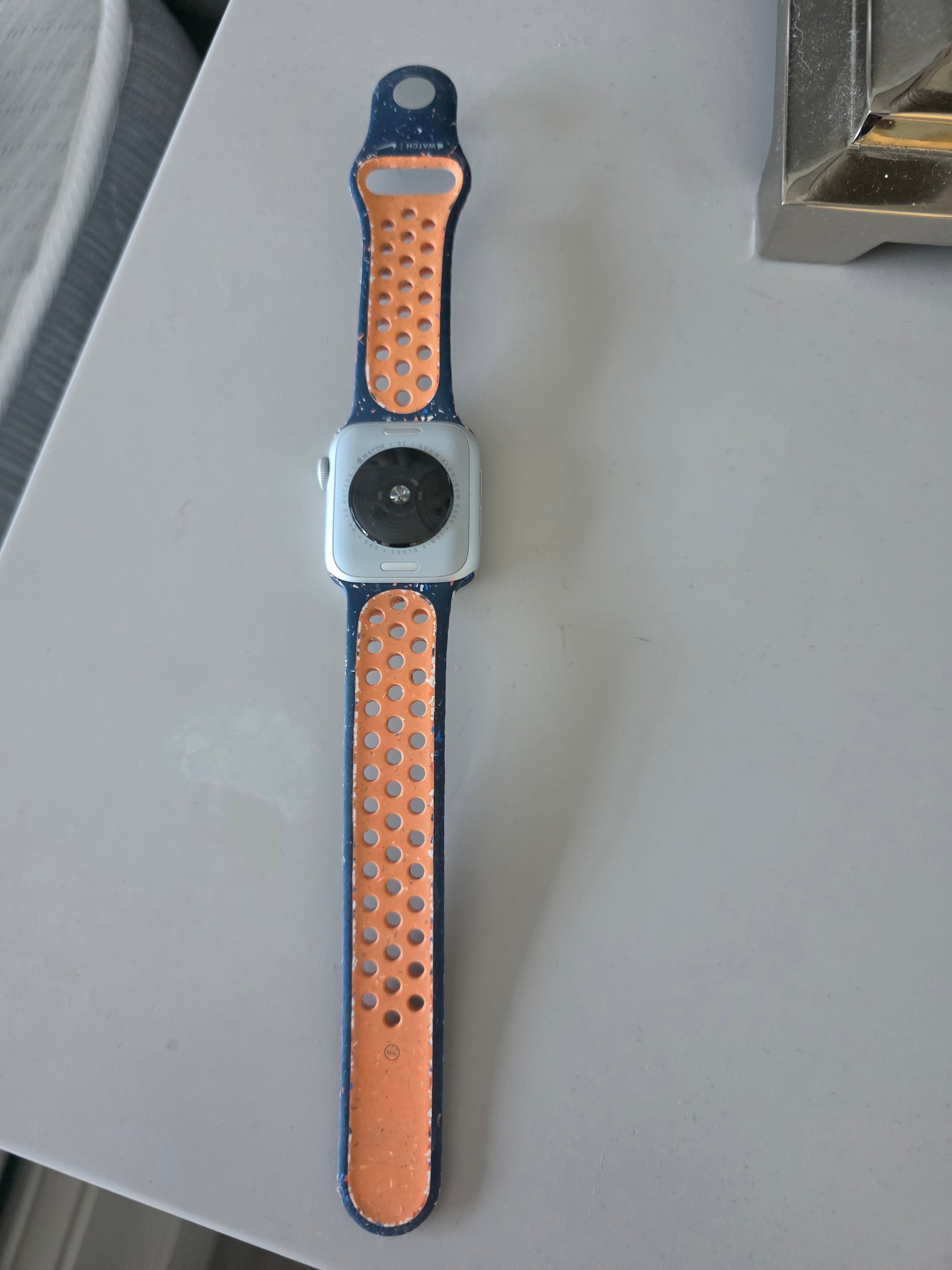 Apple Watch SE GPS, 40mm Silver Aluminium Case with Blue Flame Nike Sport Band - M/L